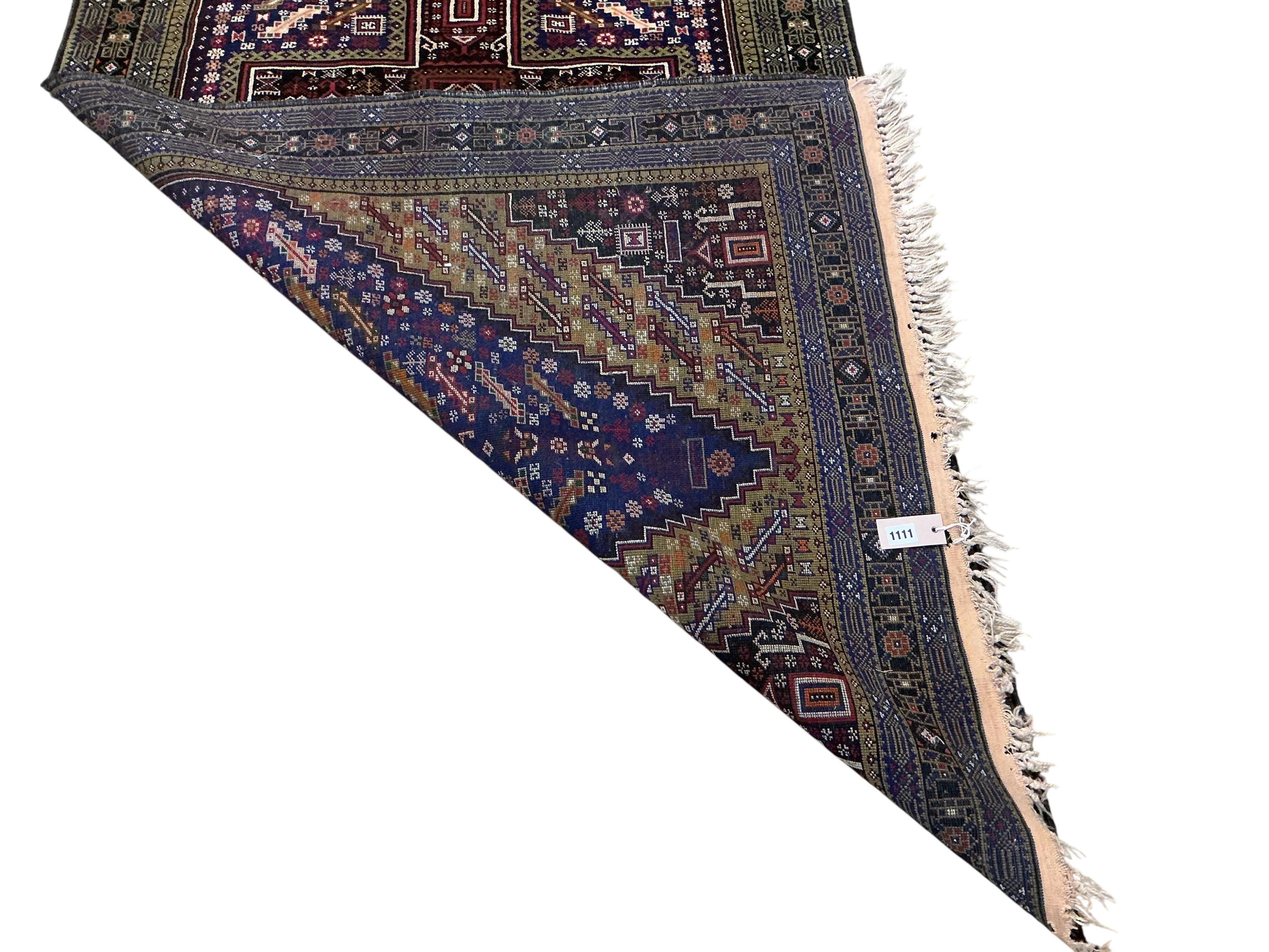 An Afghan blue ground rug 208 x 116cm, an Afghan mat and two Bokhara rugs